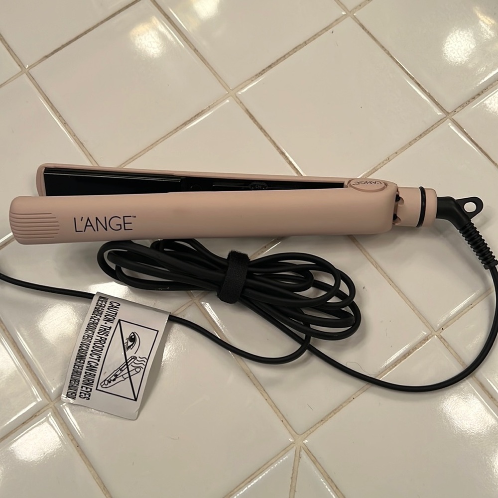 Brand new L’ange flat iron.